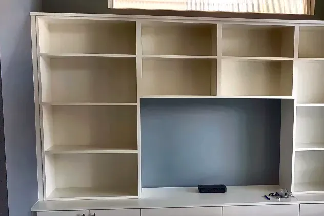 Custom closet organization system with drawers and hanging space