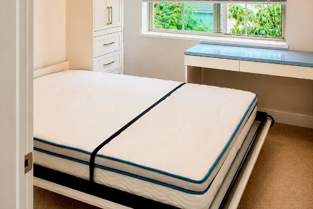 Murphy wall bed folded into custom cabinetry